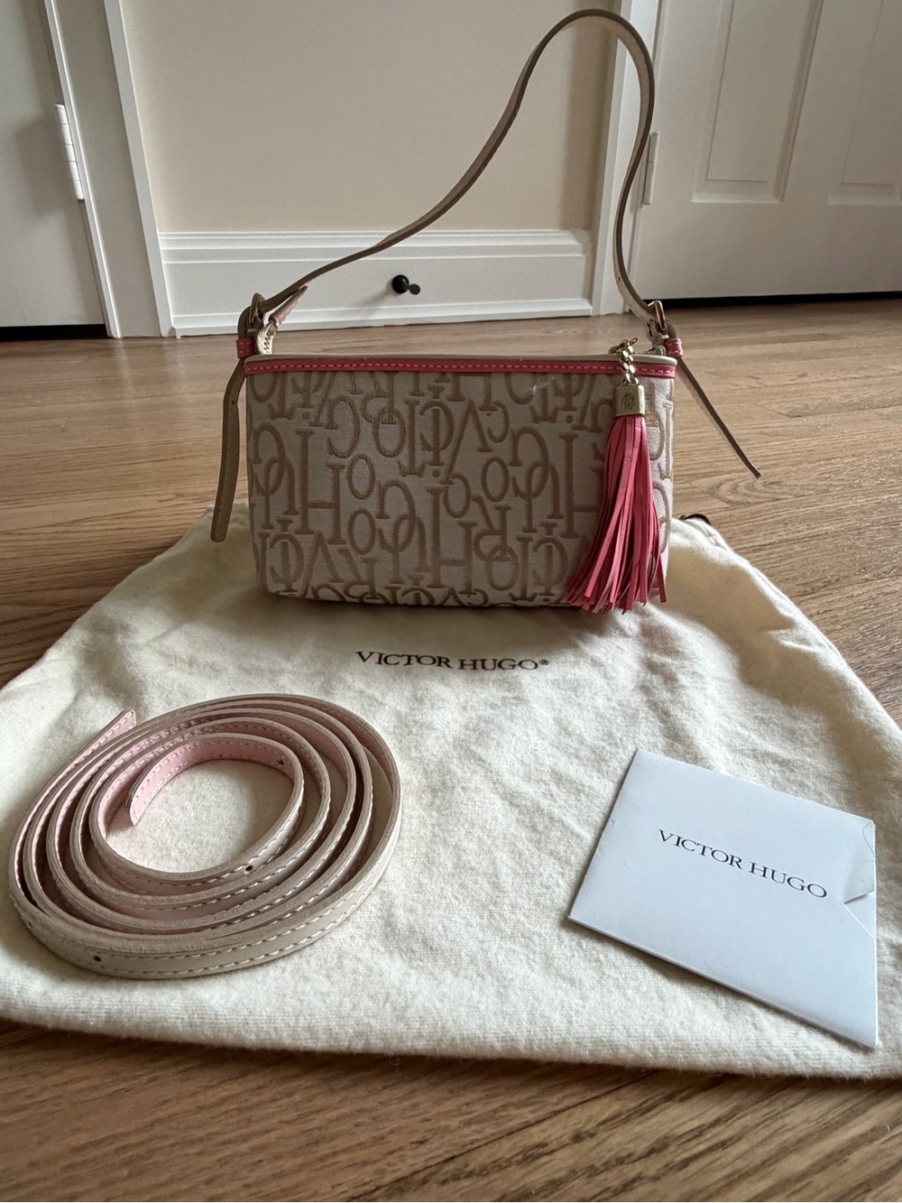 VICTOR HUGO Beige and Pink jacquard mini crossbody Bag with Tassel. Never used